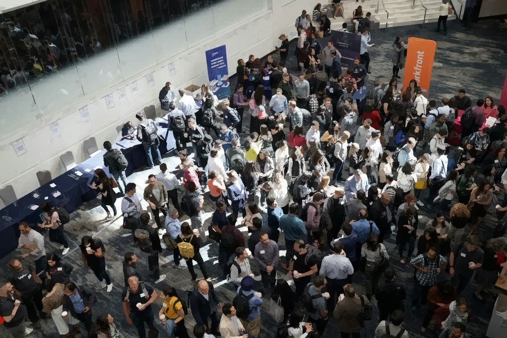 Aerial view of people mingling at a large conference