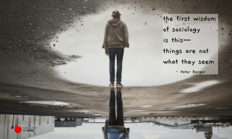 Illustration of a man wearing a hat, a hoodie, jeans and sneakers stands before an opening in a sandy landscape. At the bottom is his mirror immage, from feet to waist in a colourful landscape