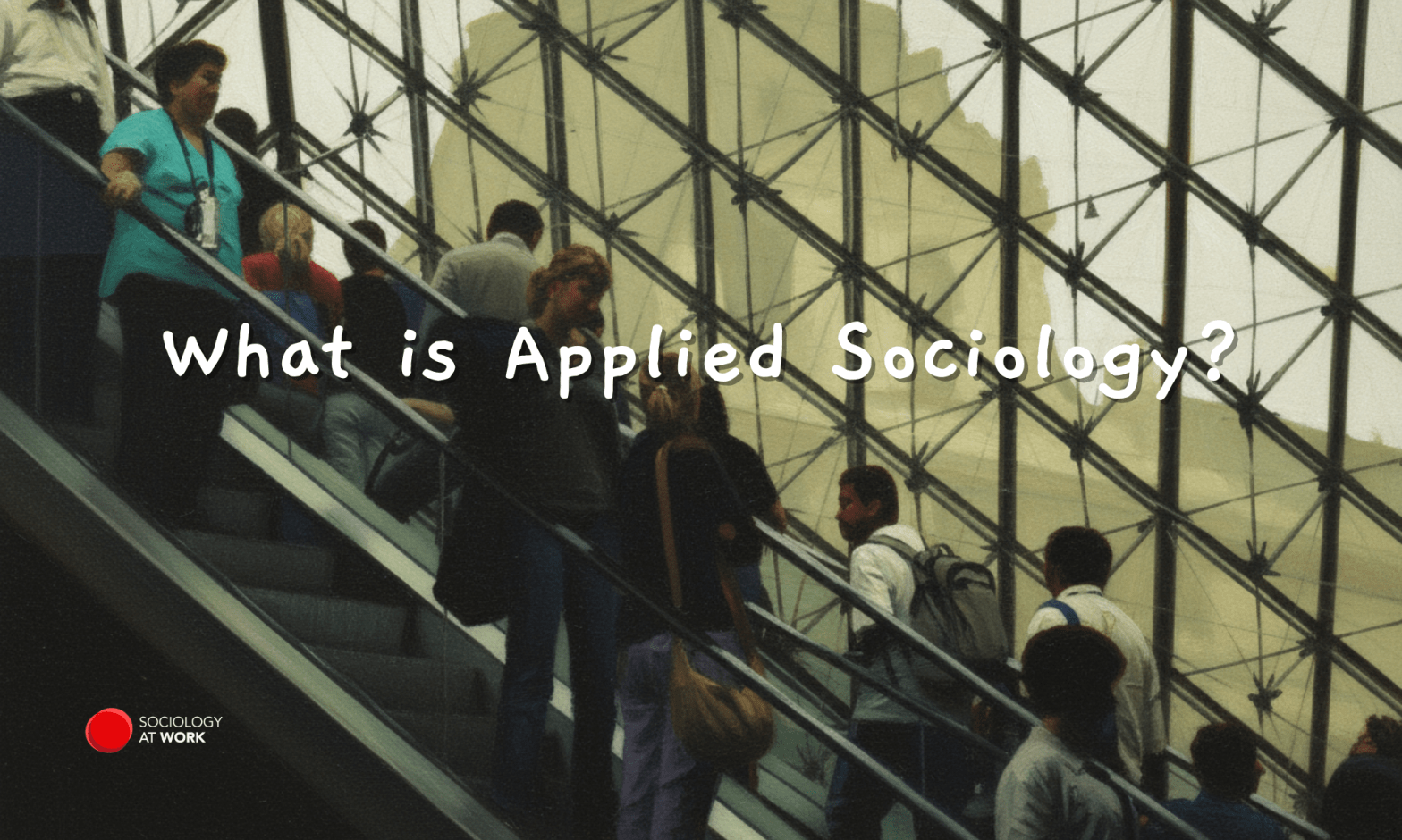 People going up an escalator inside the Louvre Museum. Text reads: What is Applied Sociology