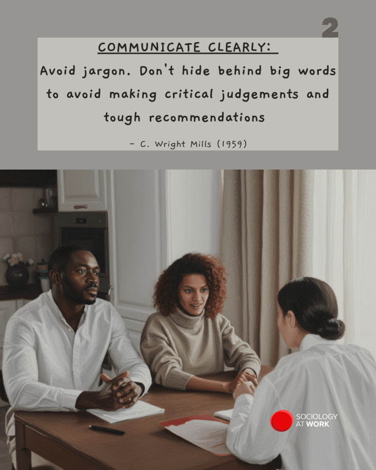A Black man and woman sit at a kitchen table, opposite a woman with documents, ready to sign