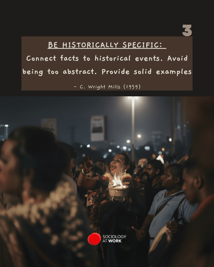A crowd gathers outdoors at night, while a woman wears flowers around her neck and sticks her tongue out. They are celebrating Thaipusam, a Tamil Hindu Festival
