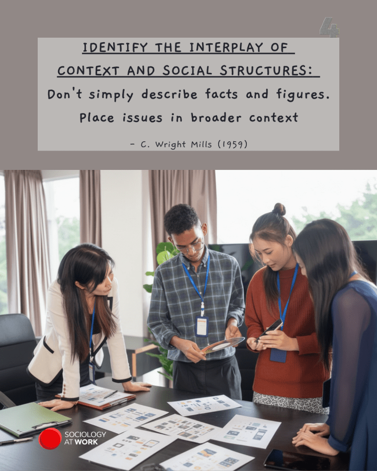 Three Asian women and a Black man look down at documents with mock-ups of mobile products