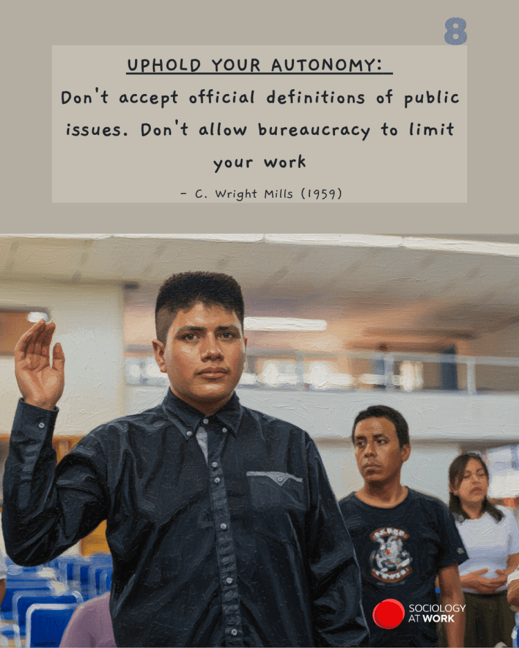 A young Latino stands and holds his hand out as if swearing an oath in a community hall